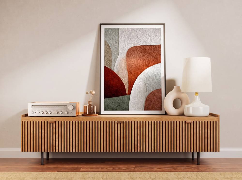 Framed abstract art print in a styled interior